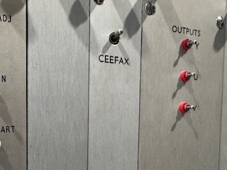 Small switch sticking out of a metal plate, labelled 'CEEFAX'