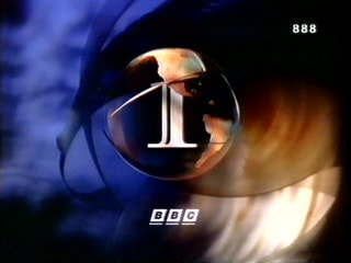 Snapshot of the 1991 BBC 1 globe - a clear globe has the American continents on, obscuring a large '1'. Blue and yellow clouds surround it. (18K)