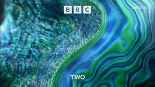 2021 version of the BBC Two blue and green crystalline ident with the new BBC corporate logo at the top (25K)